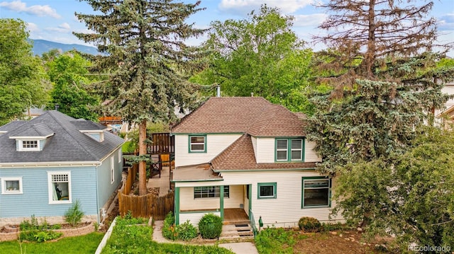 720 N Walnut St, Colorado Springs, CO 80905 - view of front of house with covered porch and a shingled roof