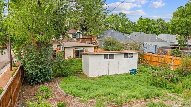 720 N Walnut St, Colorado Springs, CO 80905 - fenced backyard featuring a shed