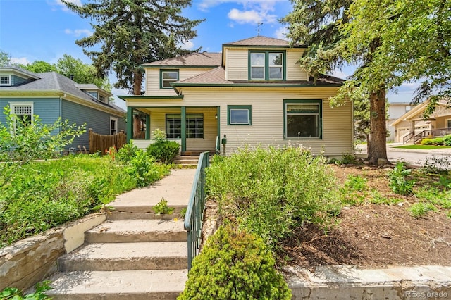 720 N Walnut St, Colorado Springs, CO 80905 - view of front of house featuring covered porch and a shingled roof