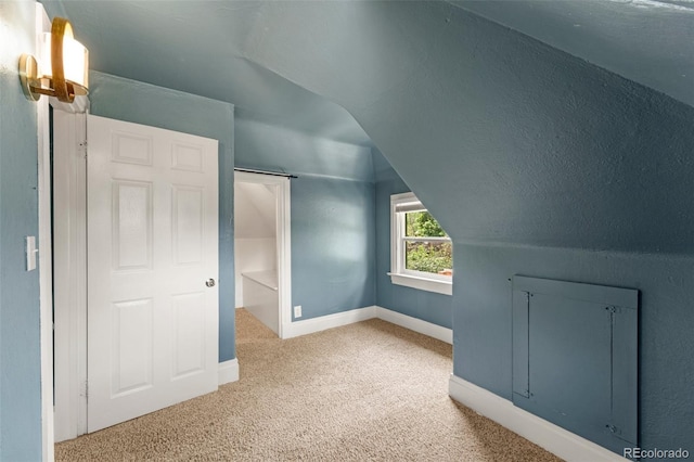720 N Walnut St, Colorado Springs, CO 80905 - bonus room featuring vaulted ceiling and carpet