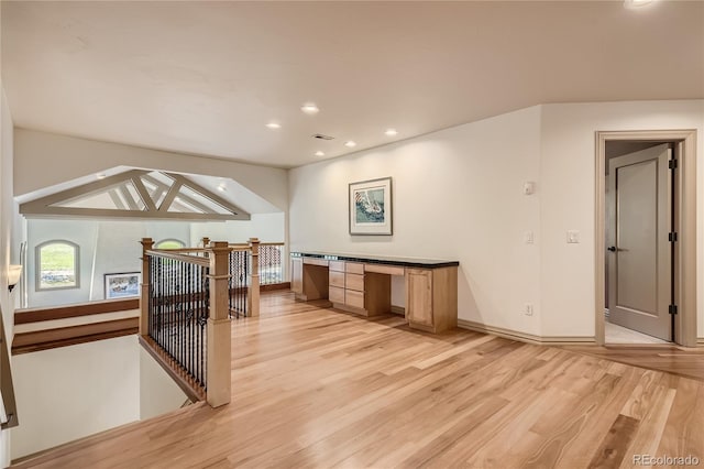13 Tamarade Dr, Littleton, CO 80127 - interior space featuring recessed lighting, built in desk, light wood-type flooring, and baseboards