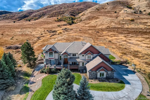 13 Tamarade Dr, Littleton, CO 80127 - drone / aerial view with a mountain view