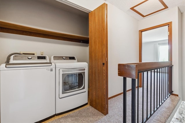 washroom with laundry area, carpet floors, baseboards, and separate washer and dryer