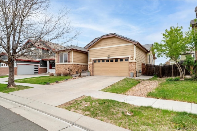 9844 Norfolk St, Commerce City, CO 80022 - view of front of property featuring driveway
