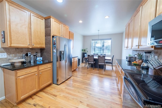 9844 Norfolk St, Commerce City, CO 80022 - kitchen featuring stainless steel appliances, light wood-style floors, backsplash, recessed lighting, and light brown cabinets