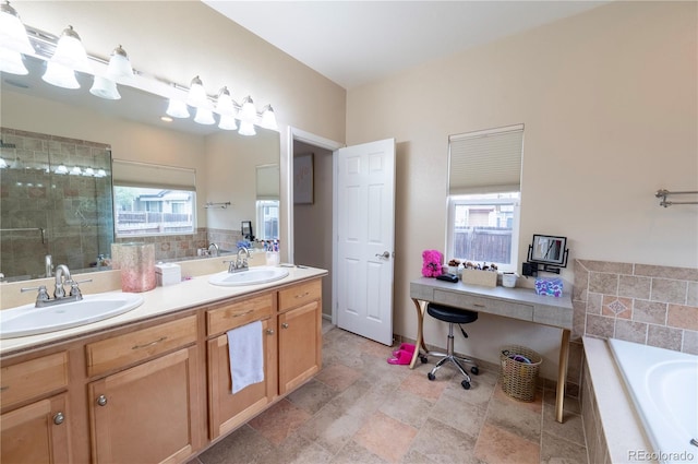 9844 Norfolk St, Commerce City, CO 80022 - bathroom with a shower stall, a garden tub, double vanity, and stone finish floors