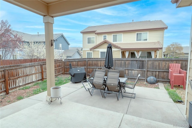 9844 Norfolk St, Commerce City, CO 80022 - fenced backyard featuring outdoor dining area, a patio area, and grilling area