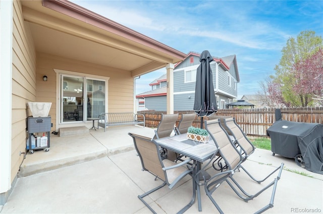 9844 Norfolk St, Commerce City, CO 80022 - view of patio with outdoor dining area and grilling area