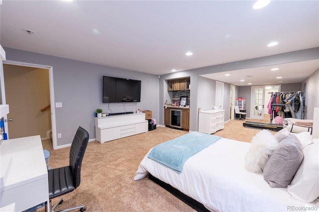 9844 Norfolk St, Commerce City, CO 80022 - bedroom with light carpet, recessed lighting, baseboards, and wine cooler