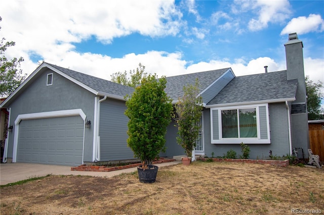 ranch-style home with a garage