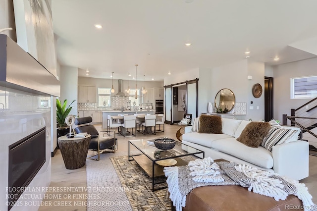 1768 Peak Loop, Broomfield, CO 80023 - living room featuring recessed lighting and a barn door
