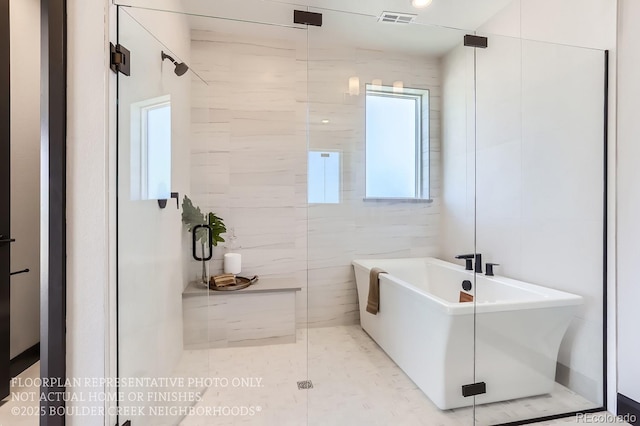1768 Peak Loop, Broomfield, CO 80023 - full bath featuring a freestanding tub and a stall shower