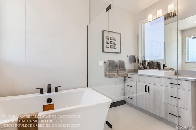 1768 Peak Loop, Broomfield, CO 80023 - bathroom featuring a soaking tub and vanity