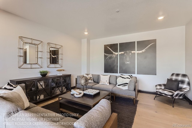 1768 Peak Loop, Broomfield, CO 80023 - living area featuring wood finished floors and recessed lighting