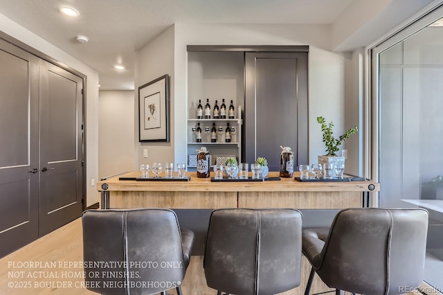 1768 Peak Loop, Broomfield, CO 80023 - indoor dry bar featuring wood finished floors and recessed lighting