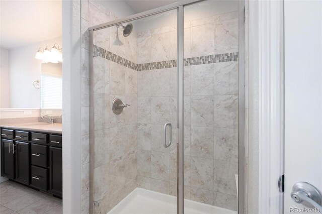 8230 Misty Moon Dr, Colorado Springs, CO 80924 - full bathroom featuring a stall shower and vanity