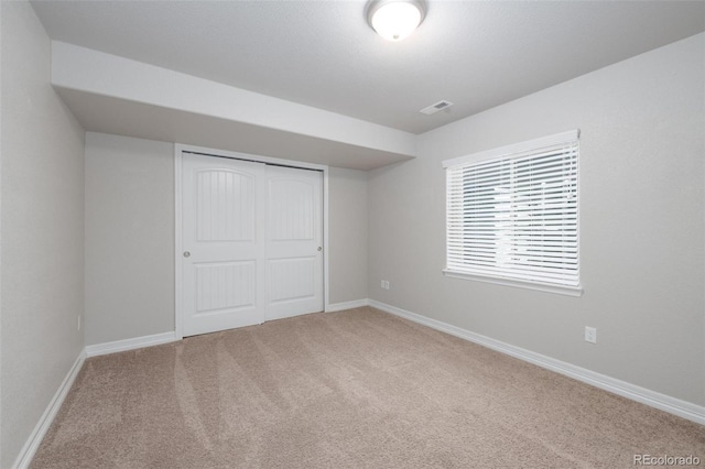 8230 Misty Moon Dr, Colorado Springs, CO 80924 - unfurnished bedroom with carpet floors, a closet, and baseboards
