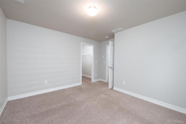 8230 Misty Moon Dr, Colorado Springs, CO 80924 - spare room with light carpet and baseboards