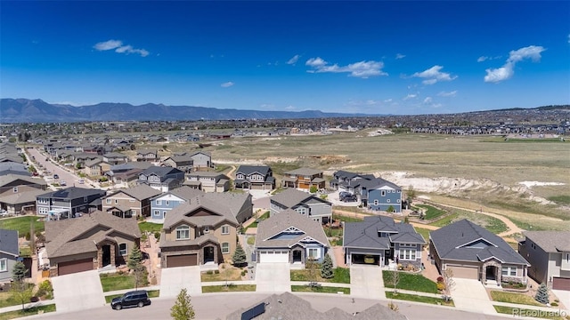 8230 Misty Moon Dr, Colorado Springs, CO 80924 - aerial view of residential area featuring a mountainous background