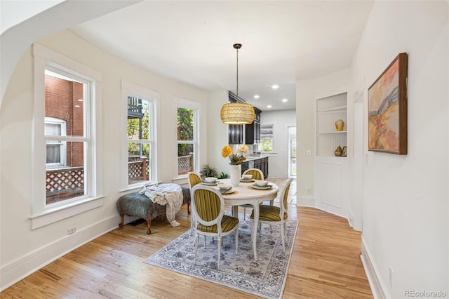2738 W 38th Ave, Denver, CO 80211 - dining area with light wood-type flooring and baseboards