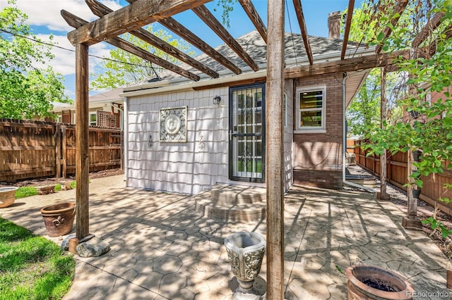 2738 W 38th Ave, Denver, CO 80211 - view of patio / terrace featuring a fenced backyard, a pergola, and a fire pit