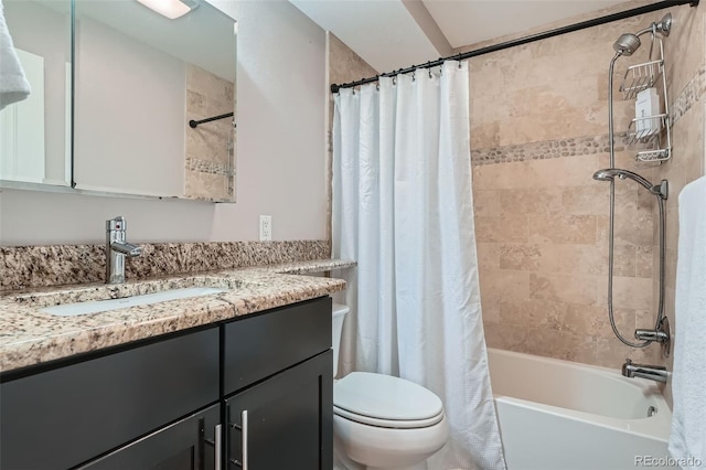 bathroom featuring toilet, shower / bath combination with curtain, and vanity