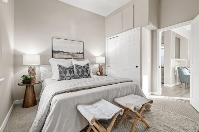 carpeted bedroom featuring a closet