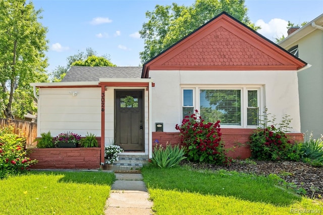 3024 S Sherman St, Englewood, CO 80113 - view of front of property featuring stucco siding