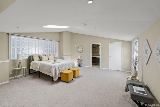 bedroom with recessed lighting, lofted ceiling with skylight, carpet, and baseboards