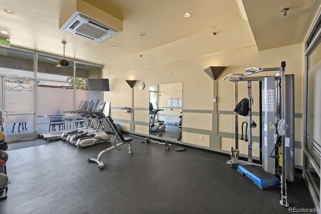 exercise room featuring recessed lighting