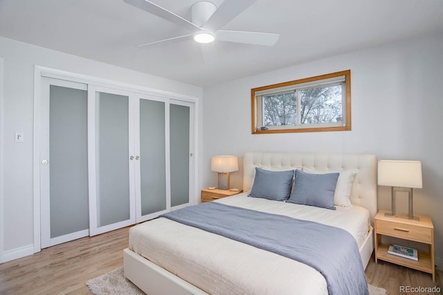 6280 Quay St, Arvada, CO 80003 - bedroom with wood finished floors, a closet, a ceiling fan, and baseboards