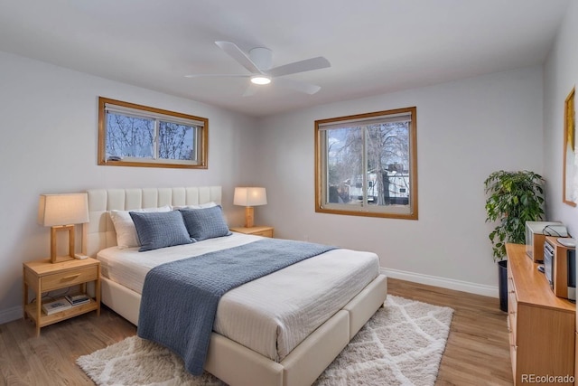 6280 Quay St, Arvada, CO 80003 - bedroom with baseboards, light wood-style floors, and ceiling fan