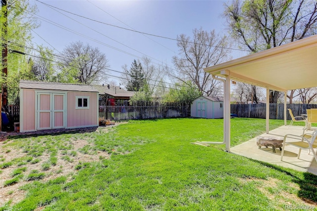 6280 Quay St, Arvada, CO 80003 - view of yard with a storage shed, a patio, and an outbuilding