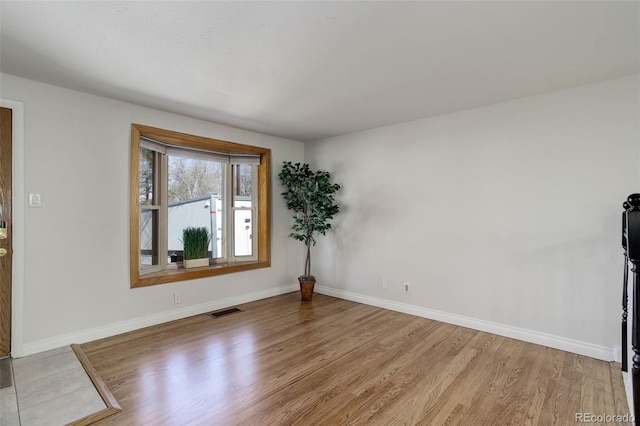 6280 Quay St, Arvada, CO 80003 - unfurnished room with wood finished floors and baseboards