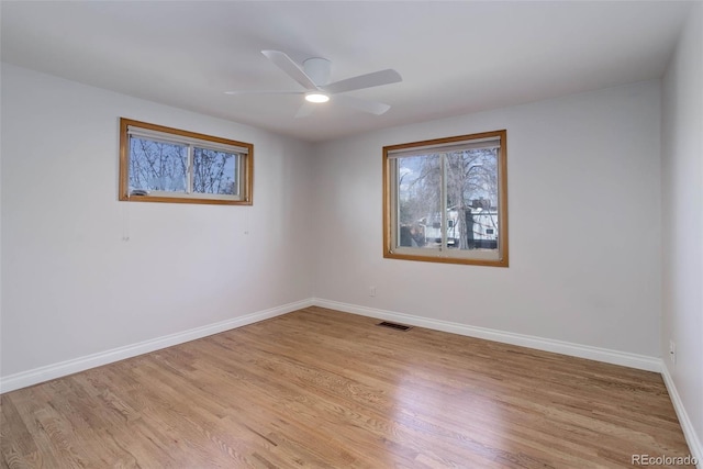 6280 Quay St, Arvada, CO 80003 - spare room with baseboards, light wood-type flooring, and a ceiling fan