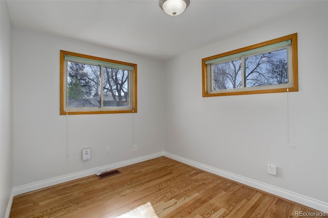 6280 Quay St, Arvada, CO 80003 - unfurnished room featuring wood finished floors and baseboards