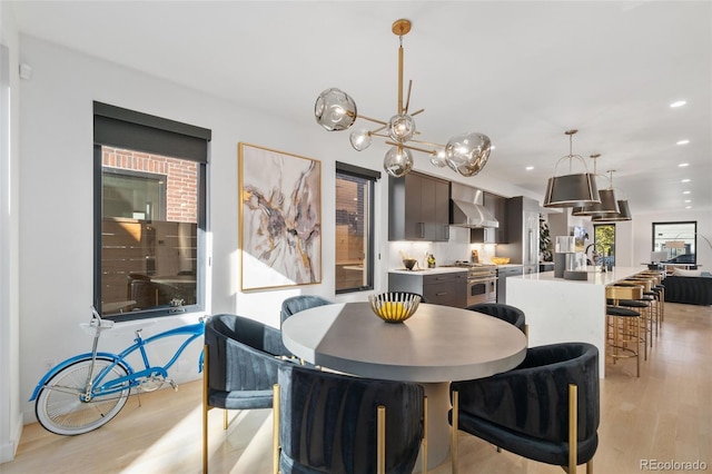 3709 Tejon St, Denver, CO 80211 - dining space with light wood-style flooring, recessed lighting, and a chandelier