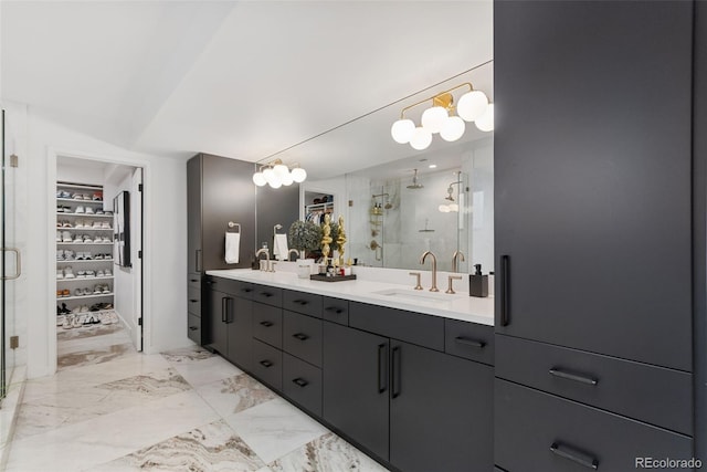 3709 Tejon St, Denver, CO 80211 - bathroom with a stall shower, double vanity, marble finish floors, and a spacious closet