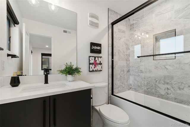 3709 Tejon St, Denver, CO 80211 - bathroom with vanity and bath / shower combo with glass door