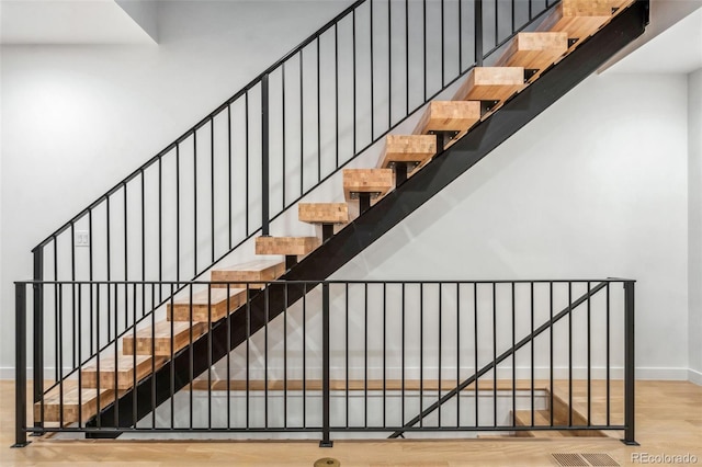 3709 Tejon St, Denver, CO 80211 - stairs with wood finished floors and baseboards