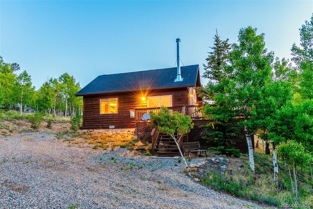 168 Mountain Vis, Como, CO 80432 - view of side of home with stairs, a deck, and a shingled roof