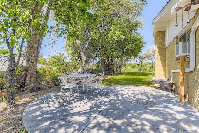 34 S Raleigh St, Denver, CO 80219 - view of patio / terrace with outdoor dining area and cooling unit