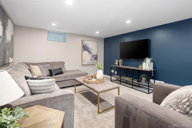 living room featuring baseboards, carpet floors, and recessed lighting