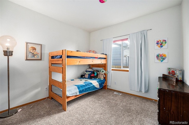 bedroom featuring carpet