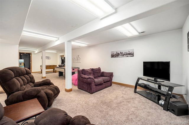 carpeted living room with pool table