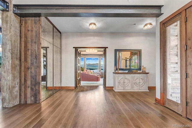 5188 Csh 125, Granby, CO 80446 - foyer featuring wood finished floors, baseboards, and beamed ceiling