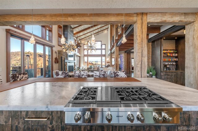 5188 Csh 125, Granby, CO 80446 - kitchen featuring stainless steel gas cooktop and beamed ceiling