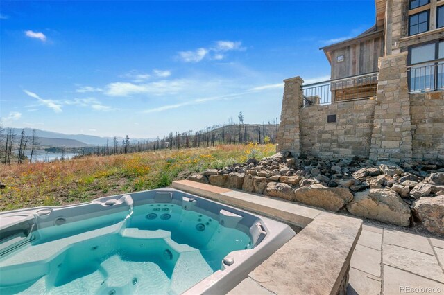 5188 Csh 125, Granby, CO 80446 - view of pool with a hot tub and a mountain view