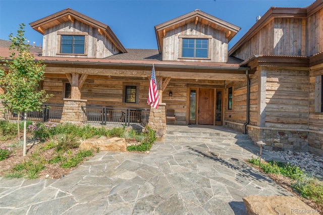 5188 Csh 125, Granby, CO 80446 - doorway to property featuring a porch