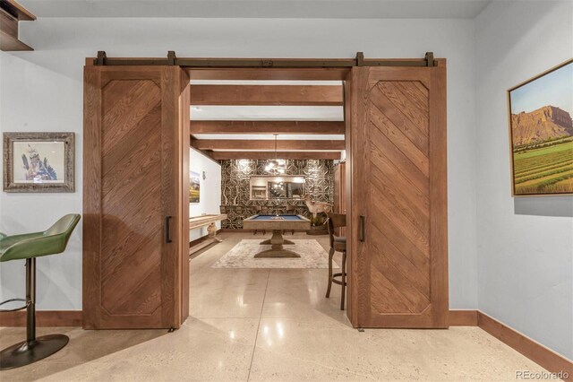5188 Csh 125, Granby, CO 80446 - hallway featuring baseboards, speckled floor, and beam ceiling